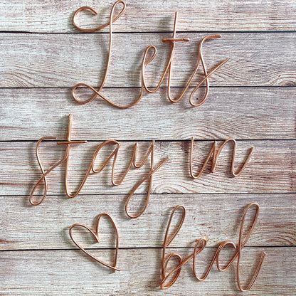 'Let’s stay in bed' Wire Sign
